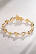 Gold 925 sterling silver bracelet with baguette and crystal stone details 21