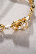 Gold 925 sterling silver bracelet with baguette and crystal stone details 21