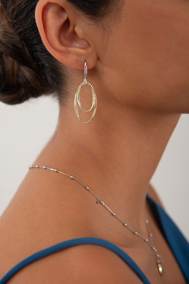 Gold 925 sterling silver earrings with interlocking oval hoop design 163