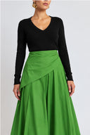 Green Long skirt with pleats, side-tie detail, and a sash 81391