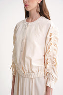Ecru Short jacket with gathered sleeves and elasticated waist with snap fasteners 61185