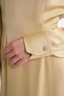 Beige Padded shoulder dress featuring an elegant gathered back 94430