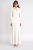 White Three-piece set: loose-fitting shirt, corset, and high-waisted skirt. 12393